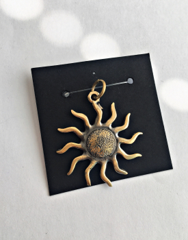 Bronze pendant "Variation on the sun"